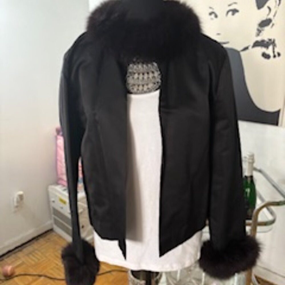 Short silk fur trimmed jacket.